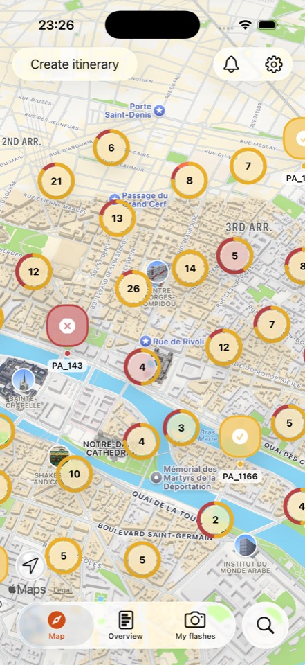 The FindInvaders map with numbered pins on Space Invader mosaics across central Paris